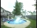Some kid does a flip 2 stories high into a pool