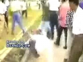 Mob beats the crap out of some dude