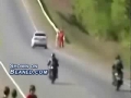 Motorcycle rear ends car and flips
